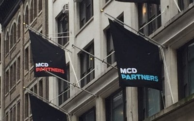 National Flag and Display produces Custom Outdoor Flag Banners for the MCD Partners
