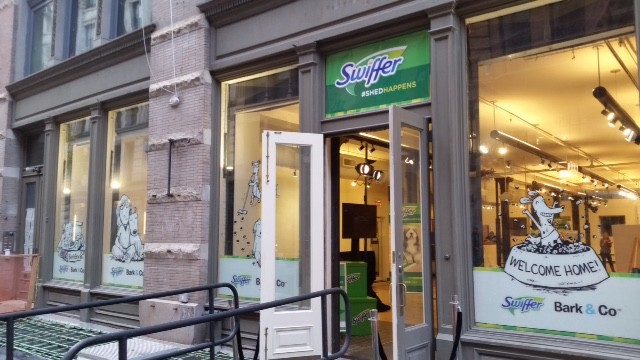 National Flag & Display produces the Custom Window and Step and Repeat Banners for Swiffer and Bark & Company