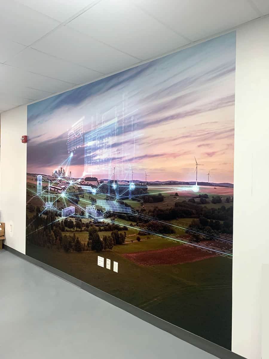National Flag and Display, produces and installs adhesive-backed vinyl wall mural for corporate headquarters.