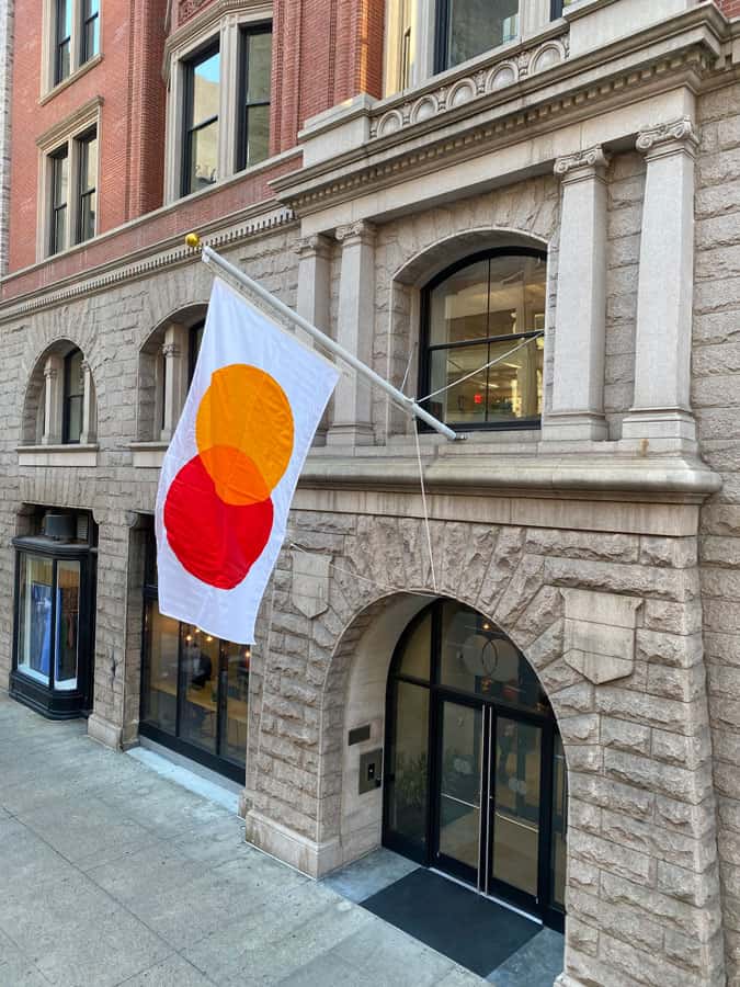National Flag and Display produces a new Custom Appliquéd flag and outrigger pole that was fabricated and installed at Mastercard headquarters on lower Fifth Avenue in New York City.